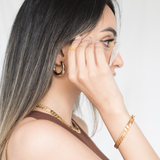 yank his chain bracelet