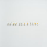 she stud him up earrings